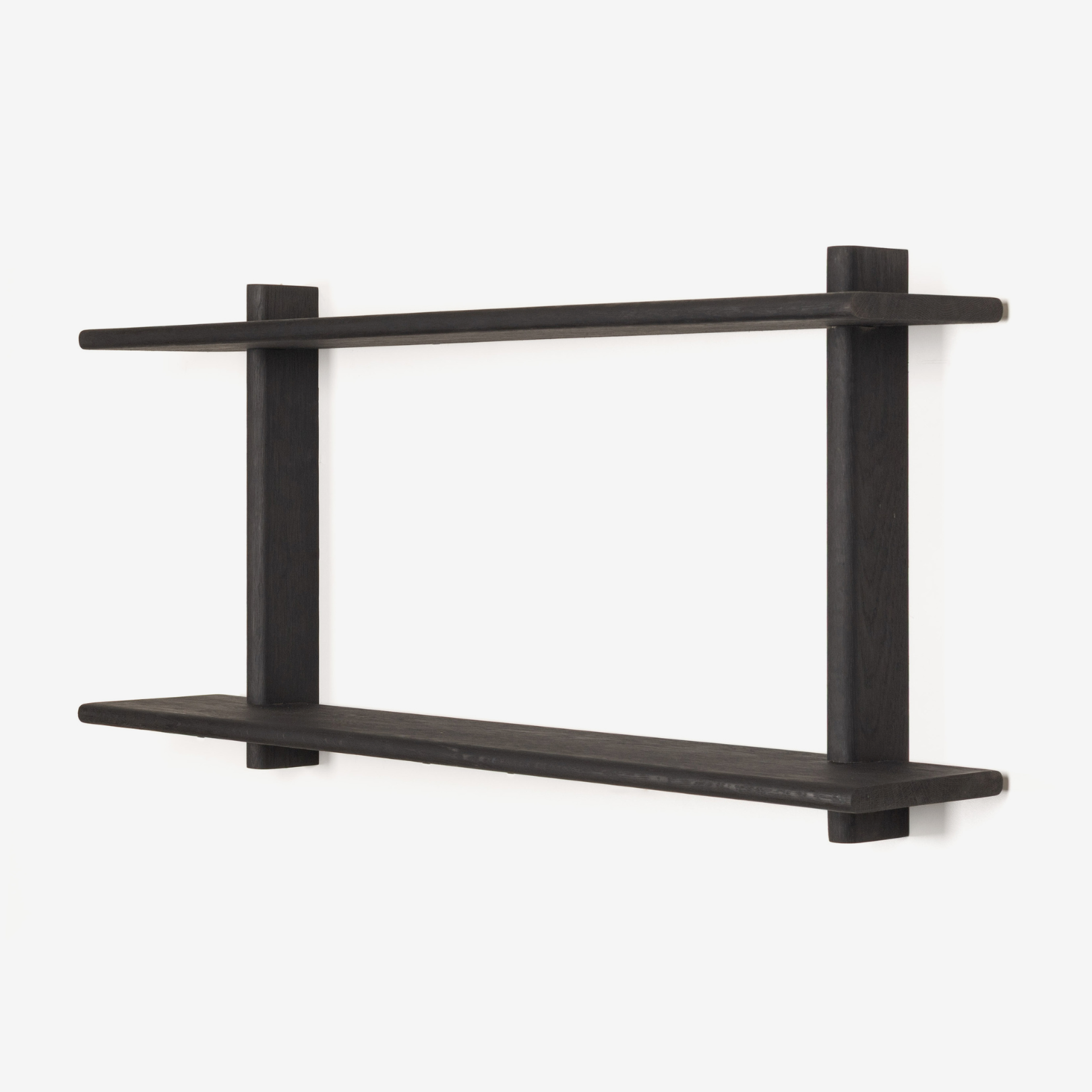 Black wall shelf with two levels on a white background