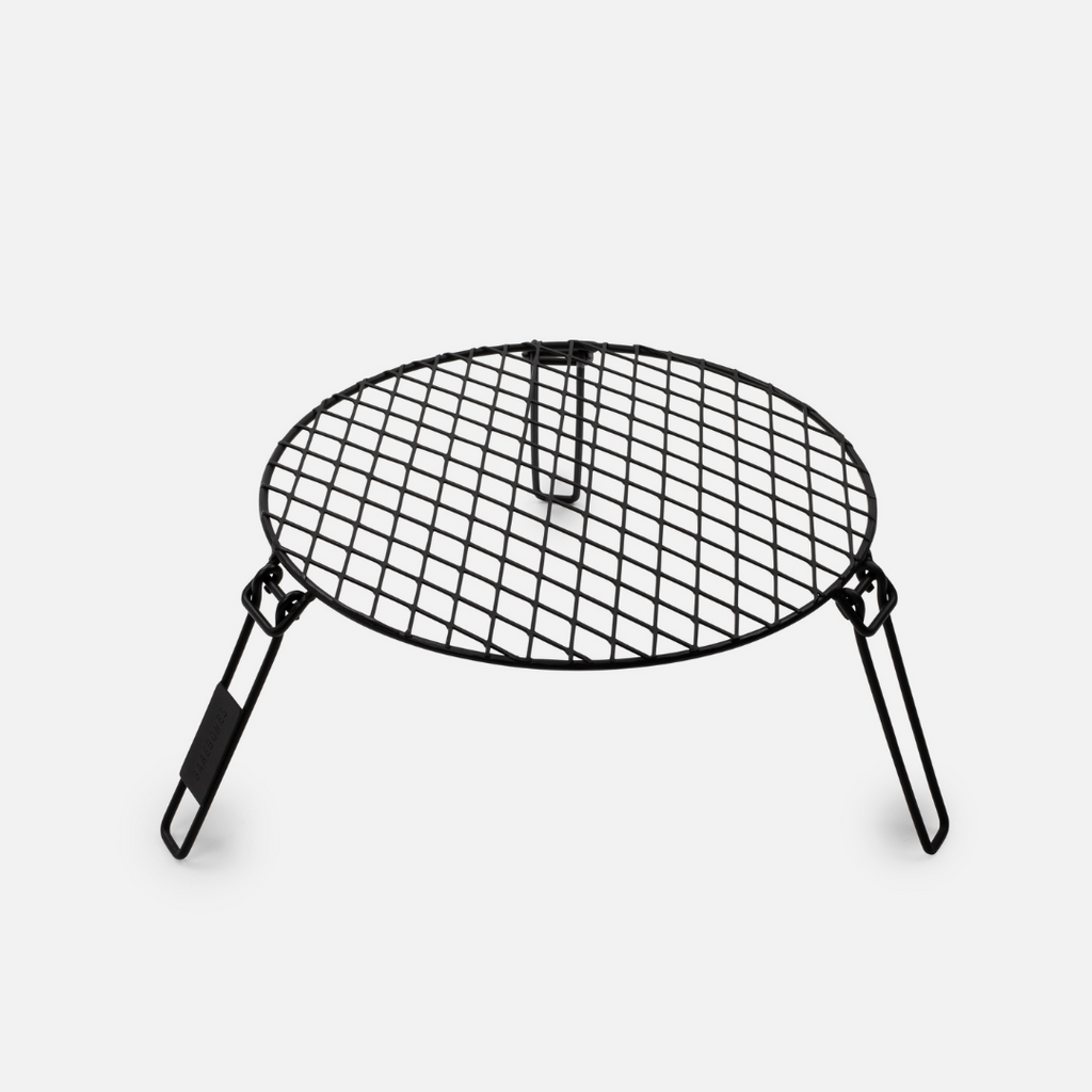 Black metal grill on a white background