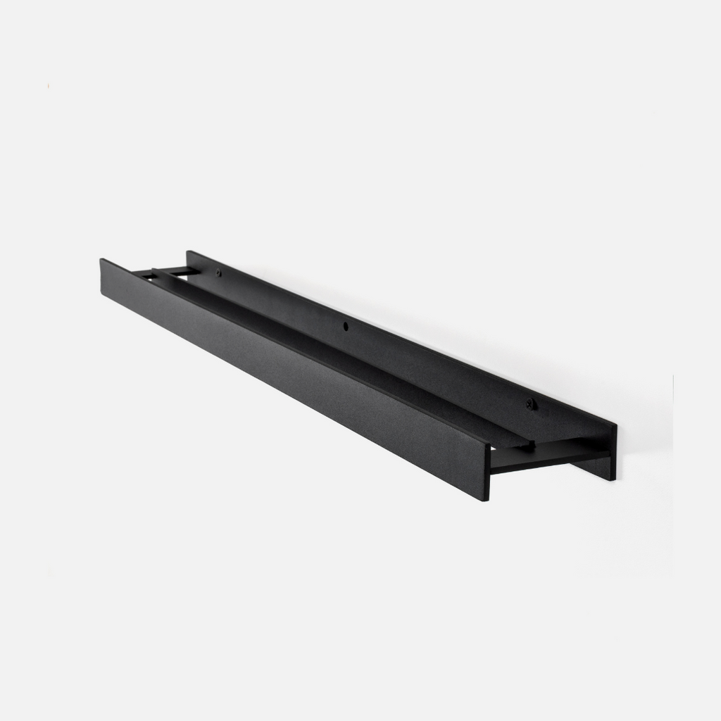 Black metal towel rack on a white background
