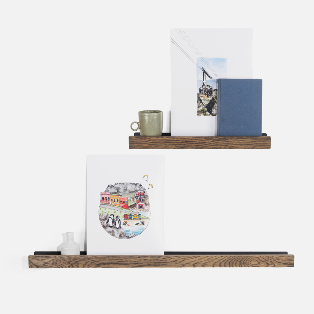 Wooden shelves with decorative items on a white background