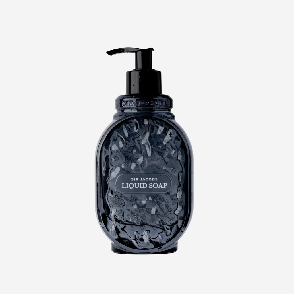 A dark navy blue textured bottle of Sir Jacobs Liquid Soap with a black pump dispenser, centered on a light gray background.