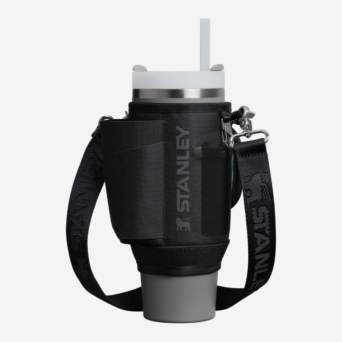 Black Stanley insulated cup holder with gray cup on a white background