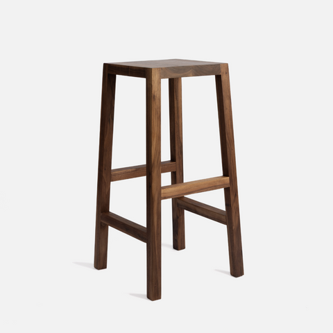 A Japandi style kitchen stool, locally made from solid Walnut.