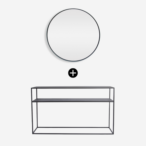 Round mirror and rectangular metal console table on a white background