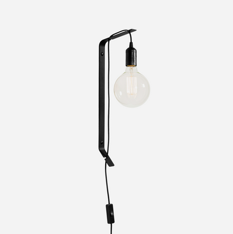 A black wall-mounted lamp with a vintage bulb, power-coated mild steel construction, and a cord length of 2.5m.